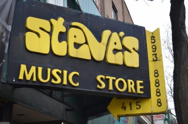 Black and yellow Steve's Music sign