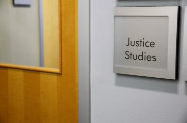 Picture of Justice Studies plaque outside Guelph-Humber office