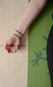 Hand tightly squeezing