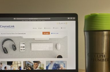 computer with course link on screen with Guelph-Humber mug beside it