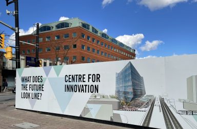 Construction poster in Brampton that says "What does the Future Look Like?" and "Centre for Innovation"